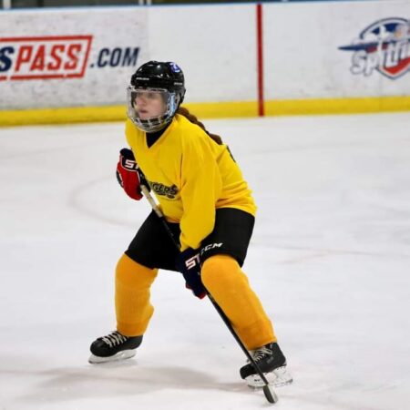 Tiffany Alexandria Paulette playing hockey