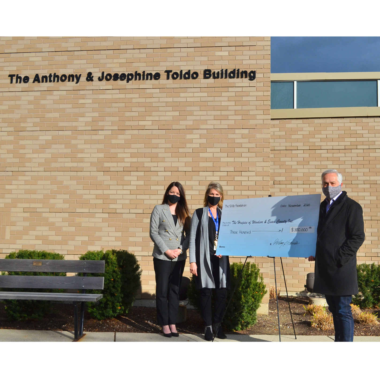 Donation in front of The Anthony & Josephine Toldo Building