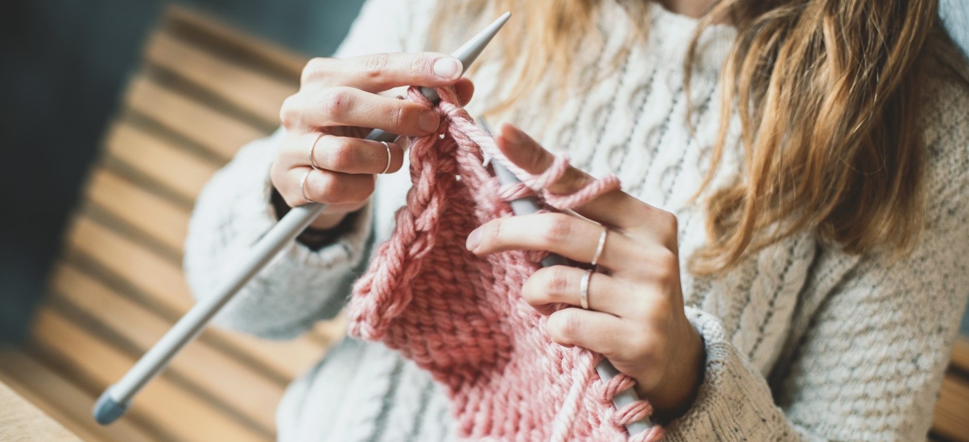 person knitting