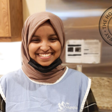 Halima volunteers in the kitchen our Windsor Residence