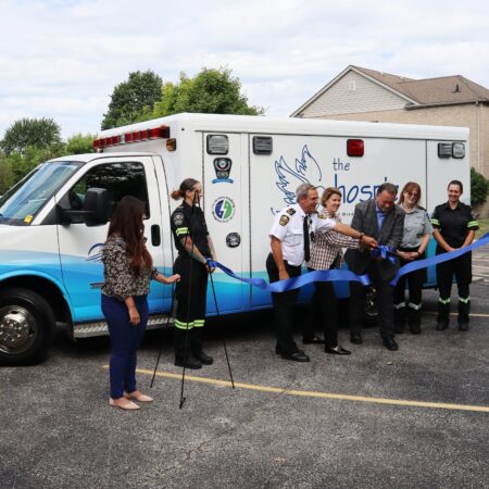 Essex-Windsor EMS, Nancy Brockenshire, and John Fairley during the ceremonial ribbon cutting for the G.E.N.I.E. Program unveiling