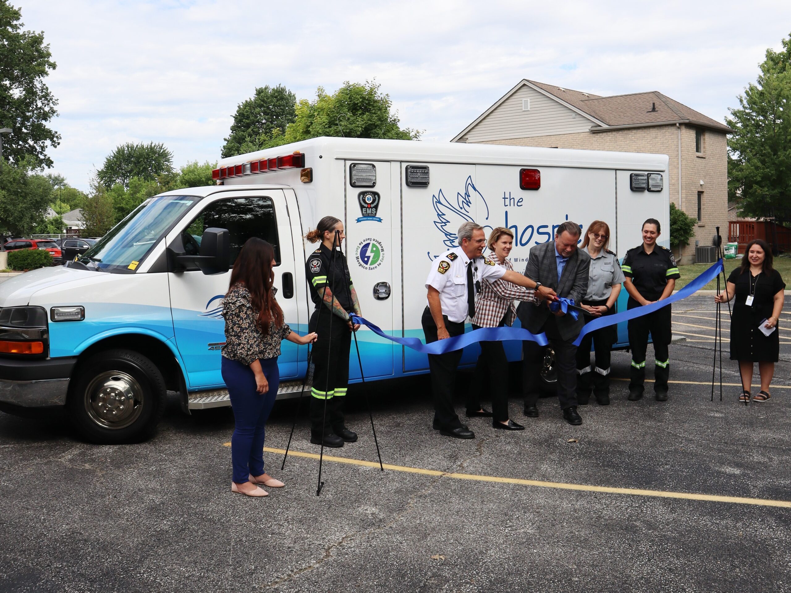 Essex-Windsor EMS, Nancy Brockenshire, and John Fairley during the ceremonial ribbon cutting for the G.E.N.I.E. Program unveiling